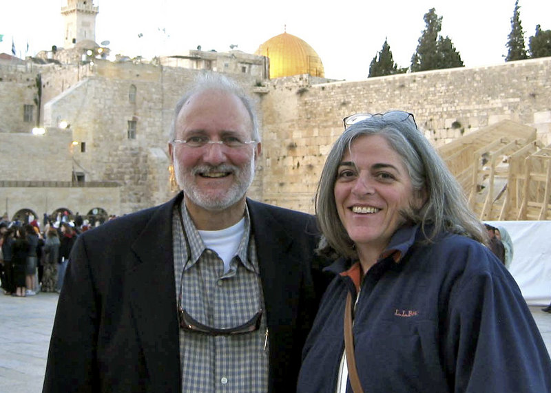 Alan Gross, shown with his wife, Judy, in Jerusalem, has been charged with “acts against the integrity and independence” of Cuba.