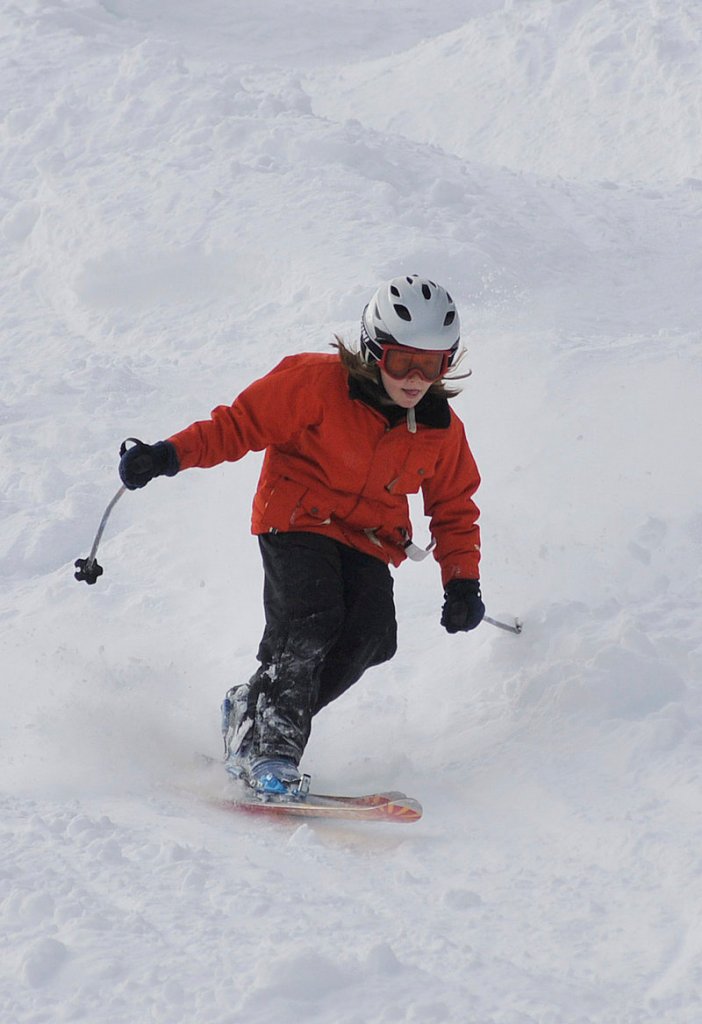 Eight-year-old Myles Barrett of Albany flies along in the mogul competition.