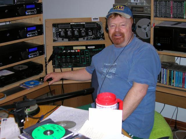 Dave Paterson, station manager for WJZF 97.1 FM, works at his Standish studio. Patterson urges community groups to inquire about free air time on the station, now in its sixth year.