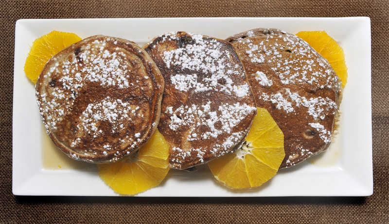 Dana Moos Chocolate Ricotta Pancakes are the little black dress of breakfast foods. They can be dressed up into an adult version with Grand Marnier syrup.