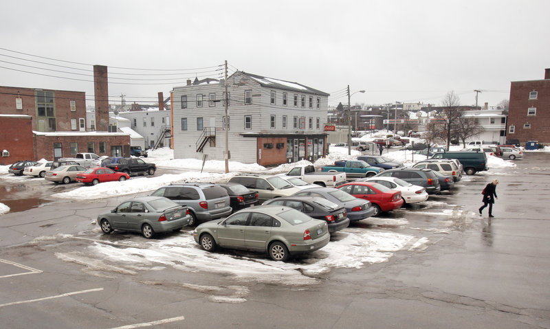 This public parking lot at Franklin and Federal streets in Biddeford, photographed Tuesday, is one of the proposed areas for a $15 million parking garage the city wants to build downtown. The structure would likely be funded by a portion of taxes from Biddeford Crossing.
