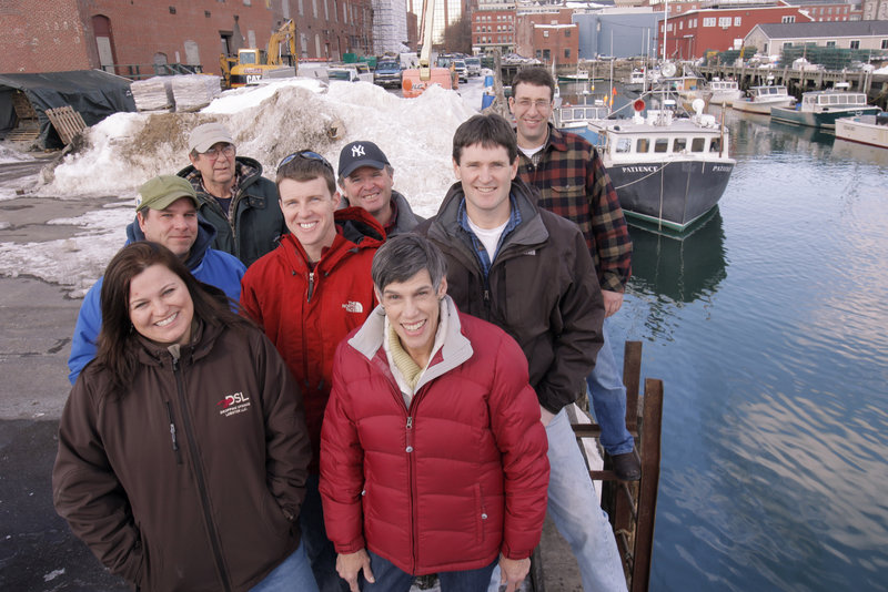 The Calendar Islands Maine Lobster Co. consists of 38 Casco Bay lobstermen who catch the lobsters and sell them as prepared food to upscale markets. They include, from left: Heidi Todd, Mark Olsen, Ernie Burgess, Jeff Legere, Mike Robinson, Emily Lane, Jason Hamilton and John Jordan, president of the company.