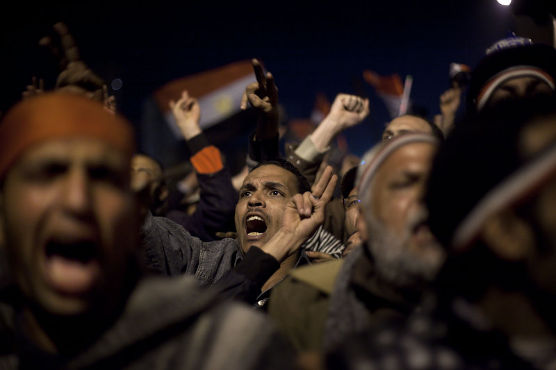Protesters in Tahrir Square react as Egyptian President Hosni Mubarak makes a televised statement to the nation Thursday.