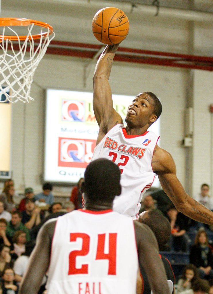 DeShawn Sims of the Red Claws goes up for a dunk Friday night during a 90-80 victory over Springfield at the Portland Expo. Sims scored a game-high 25 points as the Red Claws ended a four-game losing streak.
