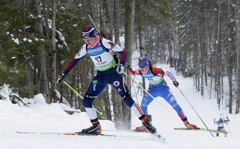 Sara Studebaker stays ahead of Russian Ekaterina Glazyrina on an uphill section of the course. Studebaker became the only U.S. biathlete to qualify for today’s mass start.