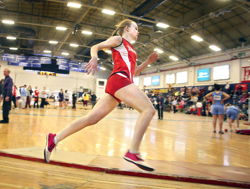 Emily Tolman of Scarborough rounds a turn on the way to winning the 600 open division race in 1:30.6.