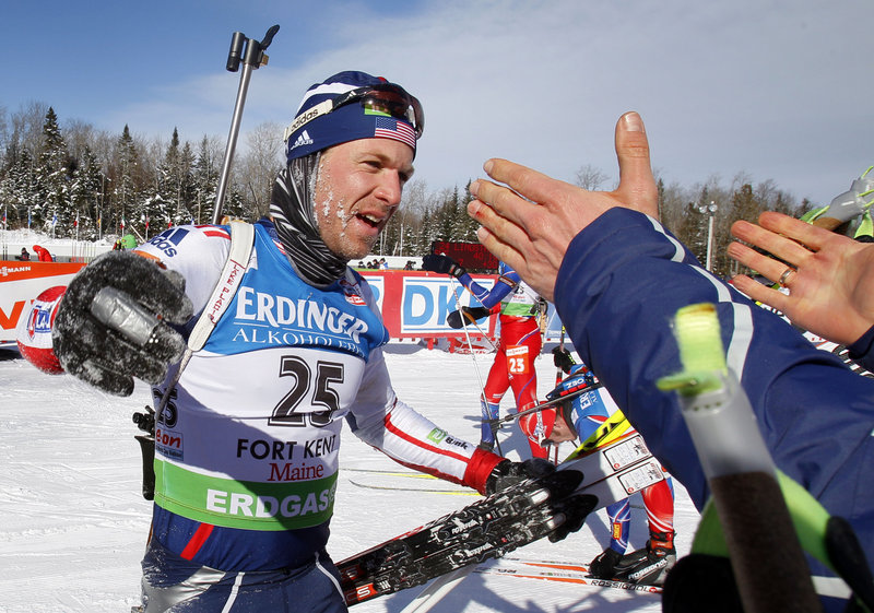 Maine Winter Sports Center alumnus Lowell Bailey accepts congratulations from a cheering crowd Sunday after he outraced Ukranian and German competitors to cap the first top-10 finish of his World Cup career, placing ninth in the final event in Fort Kent.