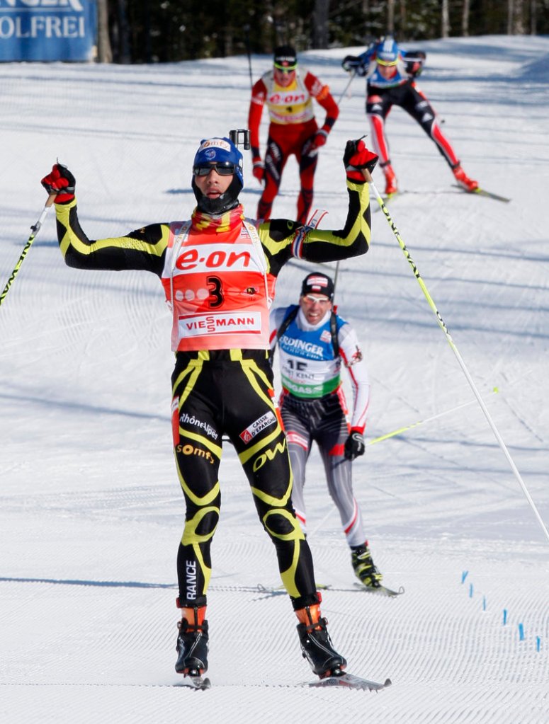 Martin Fourcade of France wins the men’s 15K mass start Sunday in Fort Kent. Poland’s Tomasz Sikora was second and Norway’s Tarjei Boe third.