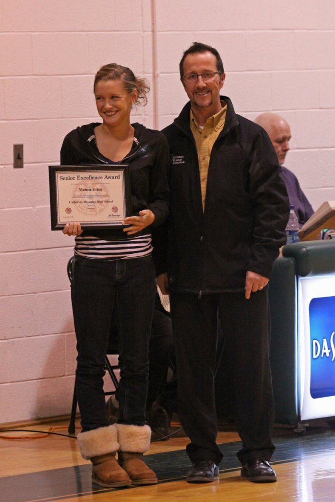 Maura Esten, captain of the girls’ soccer team at McAuley High School in Portland, received the National Soccer Coaches Association of America Senior Excellence Award in recognition of significant team contributions, leadership skills and her positive attitude. Esten is pictured with McAuley Coach Vince Aceto.