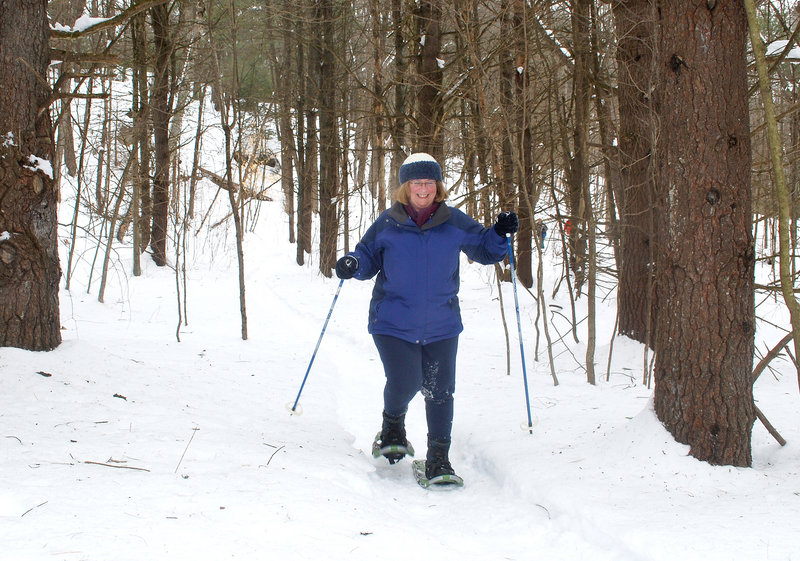 Claire Gamache of Lewiston enjoys a bit of solitude on the Homestead Trail at Androscoggin Riverlands State Park in Turner. Gamache, who retired last year, was snowshoeing for the first time and said she wanted a winter sport to help her get fit.