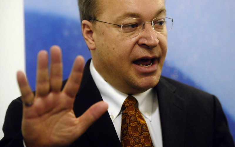 Nokia CEO Stephen Elop speaks with reporters Monday at the Mobile World Congress in Barcelona, Spain.