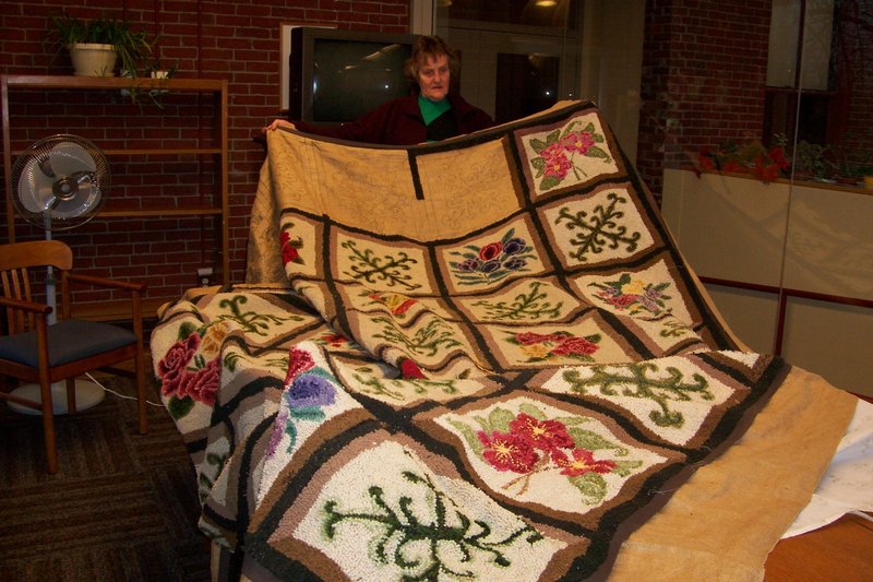 Evelyn Cookson started this rug in 1956, put it away after she married, brought it out and finished it last year. She will tell the tale, and give some instruction, on Feb. 23.