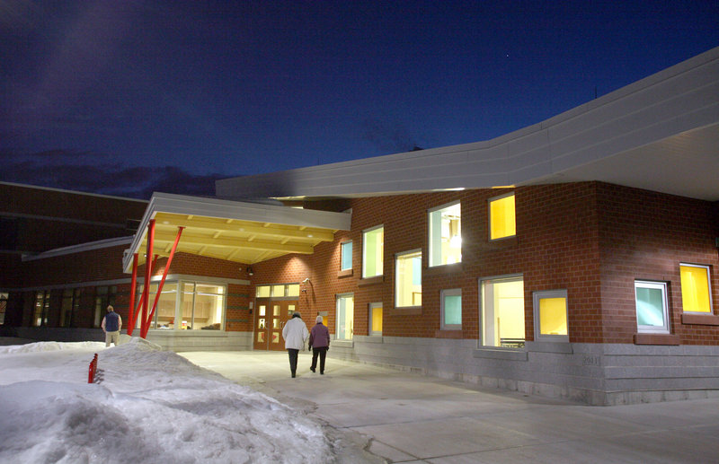 The exterior of the new Ocean Avenue Elementary School gleams in evening light during a public presentation on Wednesday.