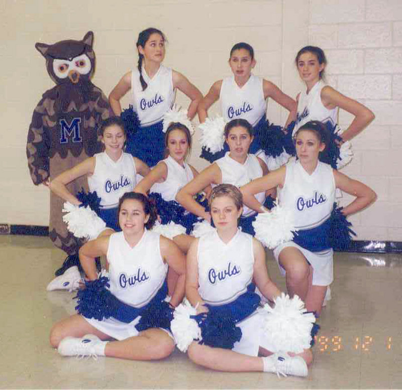 This cheerleading squad photo was taken in December 1999 and shows, from left, front row: Ashley Daigle and Lori Ann Michaud Richardson; center row: Lynel Winters, Ashley Hebert, Bonnie Cyr Lyford and Jessica Bellefleur; back row: the school mascot, Sylvie Nadeau, Alison Levesque Danielson and Amy Chasse Desjardins.