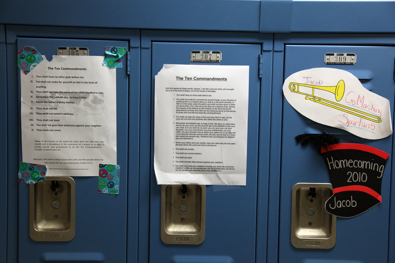 Students at Giles High School in Pearisburg, Va., posted the Ten Commandments on lockers after the superintendent ordered framed displays to be removed from school walls. The school board voted to put the wall displays back up.