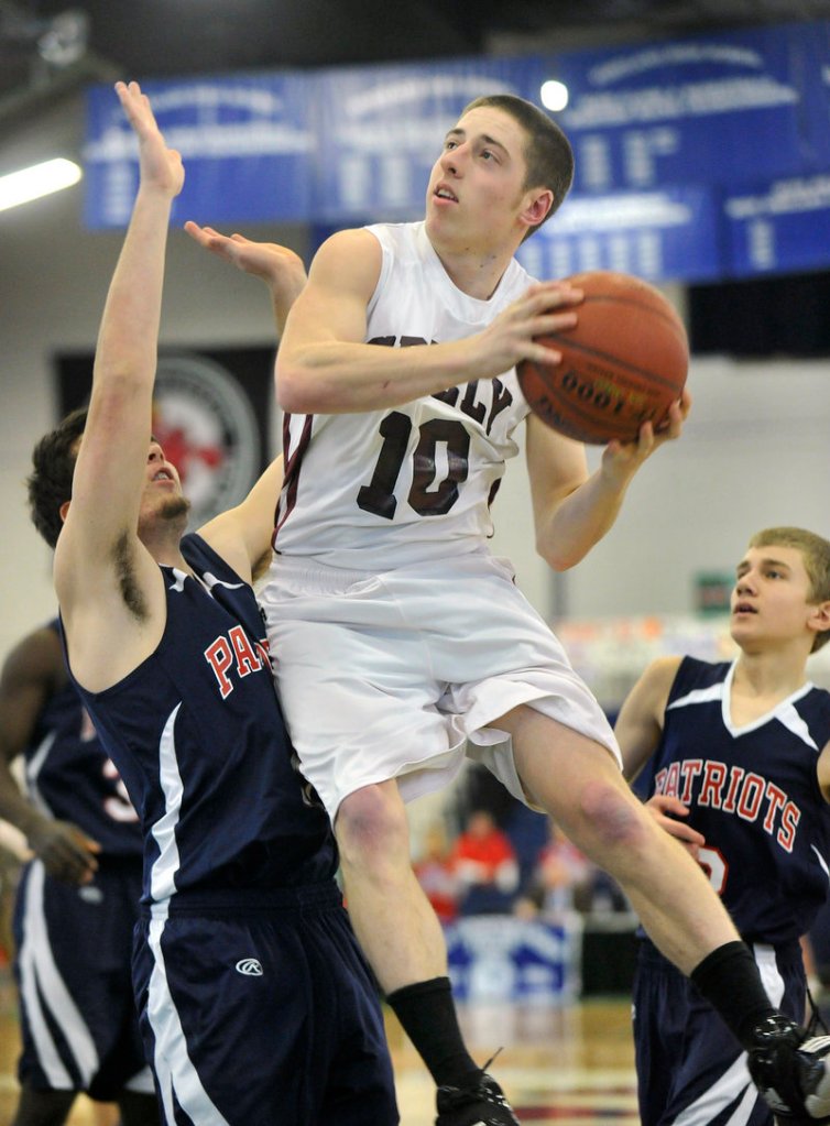 Jon Coyne of Greely drives to the basket Saturday against Adam Jensen of Gray-New Gloucester during Greely s 78-56 victory at the Portland Expo. The top-ranked Rangers will take on fourth-seeded Yarmouth in what could be a classic Western Class B semifinal Thursday night.