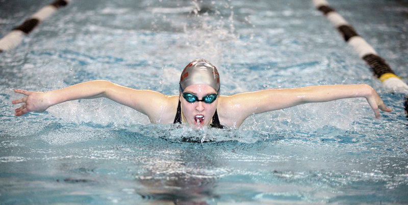 Samantha Couillard of Scarborough swims during the trials of the 200-yard individual medley at the Class A state meet Monday at Bowdoin College. Couillard advanced to the finals and placed fourth with a time of 1:43.35.