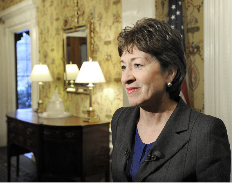 Sen. Susan Collins greets the media Tuesday at the Cumberland Club in Portland, where she spoke on the state of political discourse and the effectiveness of government.