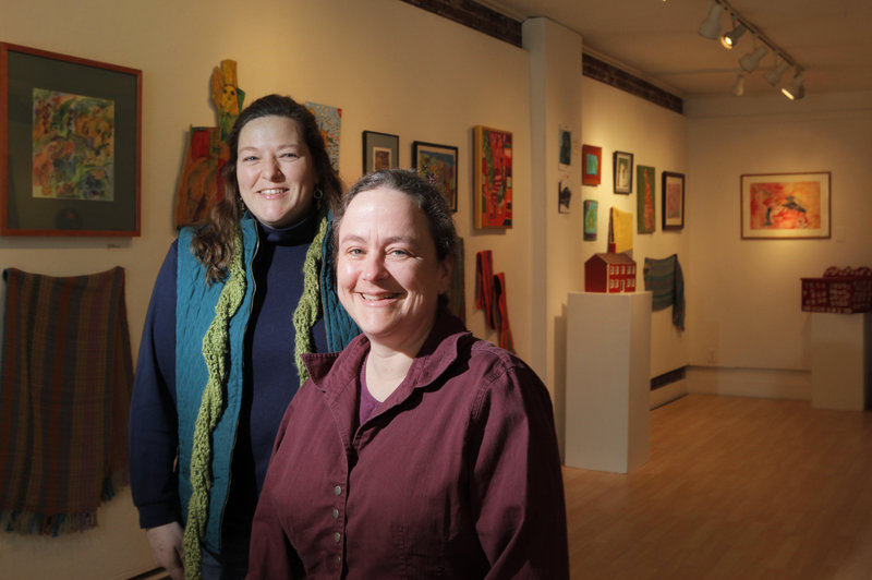 Deb Fahy, right, Harlow Gallery’s executive director, and Nancy Barron, assistant director.