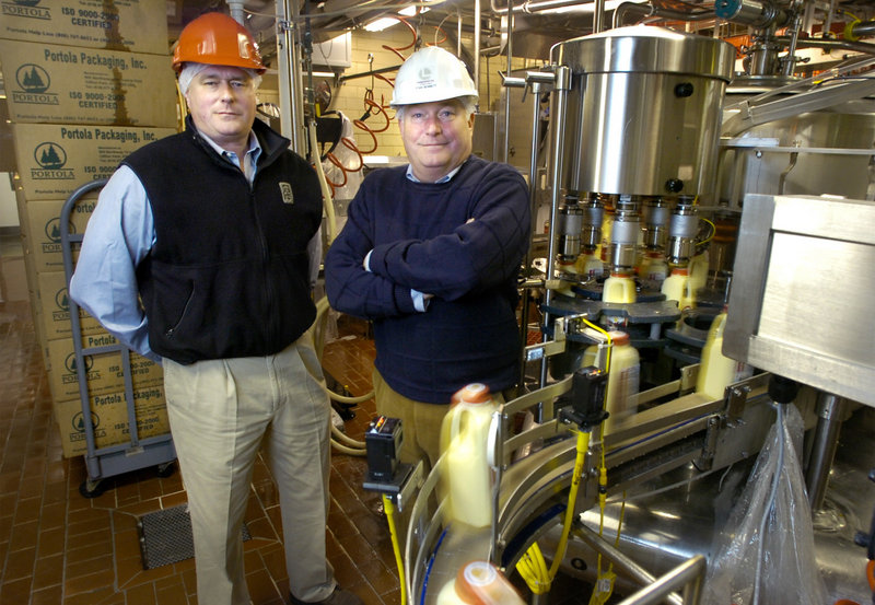 Stanley Bennett, right, and his brother William led Oakhurst Dairy’s efforts to reduce the use of fossil fuels by improving the efficiencies of existing equipment and using cleaner energy sources.