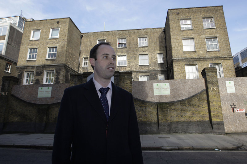 Aimery de Malet is part of a campaign in London to save the building behind him that historians believe was author Charles Dickens’ inspiration for “Oliver Twist.” The building was once a workhouse where the destitute labored for gruel.
