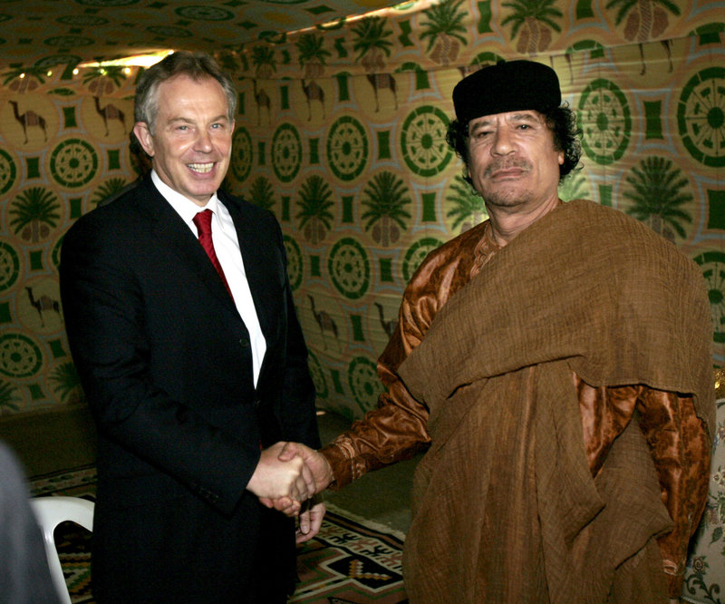 Britain’s Prime Minister Tony Blair, left, meets Libyan leader Moammar Gadhafi outside Sirte, south of Tripoli, in May of 2007. Blair’s role in Gadhafi’s international rehabilitation is now being questioned as his regime crumbles and the strategic decision to build ties with the despot is a major source of anti-Western anger.
