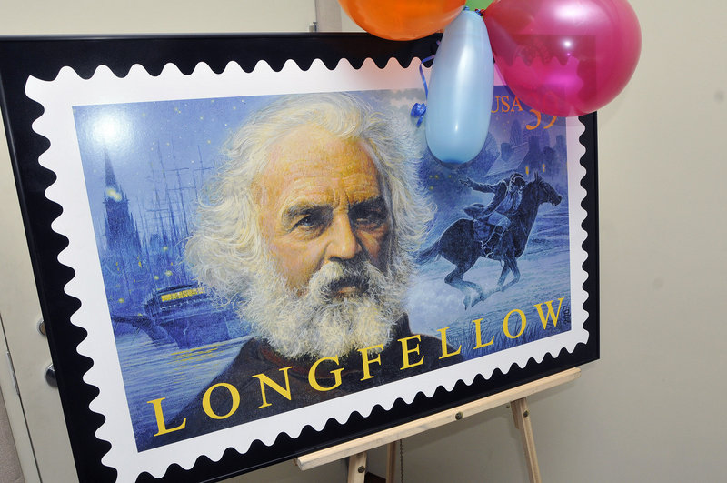 The Henry Wadsworth Longfellow stamp is displayed Saturday at a birthday party for the poet at the Maine Historical Society in Portland. Longfellow was born in Portland in 1807.