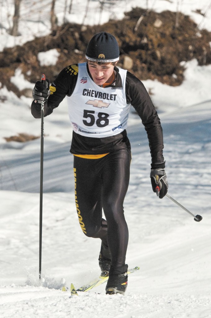 STRIDING FOR HOME: Maranacook's Tyler DeAngelis climbs the final hill of the 5K classical course Thursday morning at Black Mountain. DeAngelis won the race to capture the overall individual title. He also won the freestyle race earlier this week.