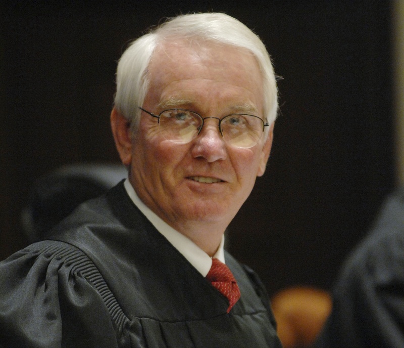 U.S. District Judge Roger Vinson of Florida declared the Obama administration's health care overhaul unconstitutional, saying that people can't be required to buy health insurance.