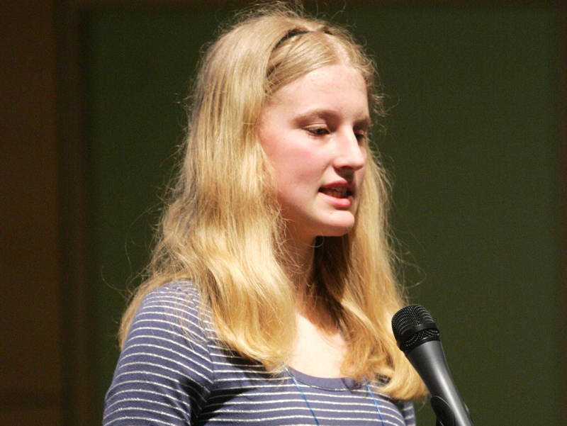 Cape Elizabeth eighth-grader Lily Jordan, the defending champ, represents Cumberland County on her way to victory in the Maine State Spelling Bee at USM's Hannaford Hall in Portland today.