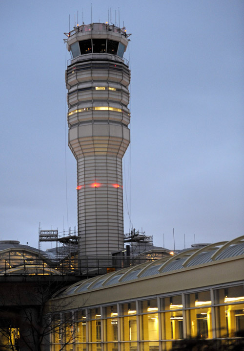 The FAA control tower at Reagan National Airport. Federal safety officials are investigating a report that two planes landed at the airport without control tower clearance because the air traffic controller was asleep.