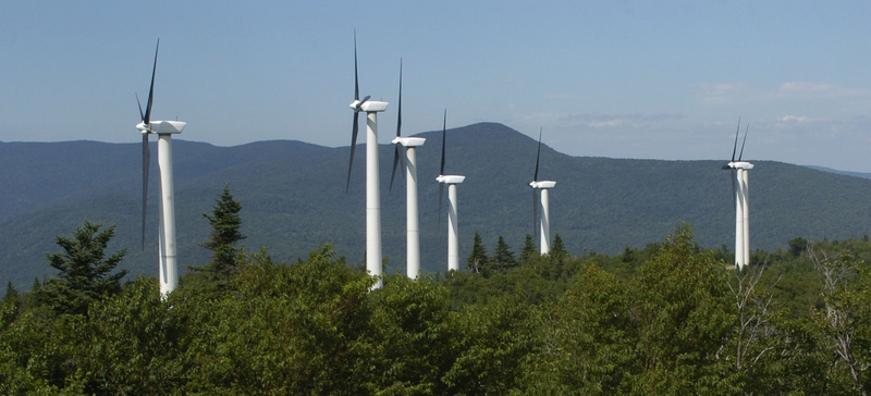 Wind turbines generate power in Searsburg, Vt., in this file photo. Maine's most active wind power developer won't say whether it's talking to Bangor Hydro's parent company as a way to raise capital privately.