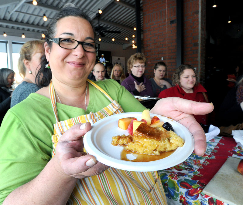 The Good Table's Lisa Kostopoulos serves a crème brulée french toast at the Second Annual Incredible Breakfast Cook-Off at the Sea Dog Brewing Co. in South Portland.