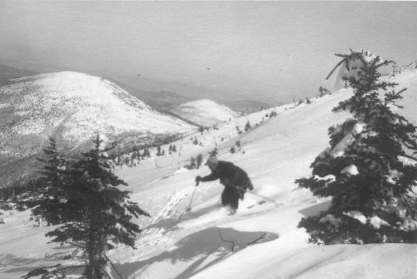 Amos Winter, Sugarloaf’s founder, skis the Carrabassett Valley snowfields, circa 1952. Such images documenting Maine’s ski history are on view at the Ski Museum of Maine in Kingfield.