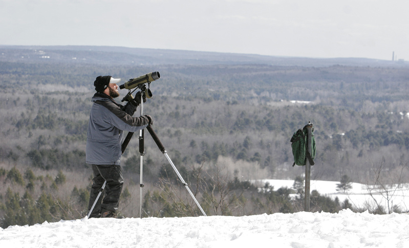 Derek Lovitch of Freeport Wild Bird Supply looks for hawks atop Bradbury Mountain during a previous migration count. This year’s spring hawk watch will begin Wednesday at the state park in Pownal. Freeport Wild Bird Supply team ups with Nikon Sport Optics to sponsor the project that collects valuable data while providing an enjoyable and educational experience for visitors. Andy Northrup, official counter this year, will be stationed at the Bradbury summit from 9 a.m. to 5 p.m. daily from Wednesday until May 15, and will be happy to answer questions about raptors. Observers are welcome to grab their binoculars and join the watch. Nikon also will provide binoculars for visitors to try out. The hawk watch is free, but there is an entry fee to the park: $3 for Maine residents ages 12-64; $1 for ages 5-11; free for those over 64 and under 5. Go online to www.freeportwildbirdsupply.com for more information.