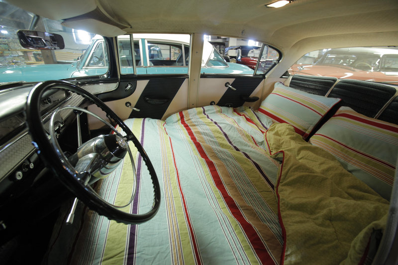 The front seats of this 1957 Nash Ambassador Custom fold down to create a sleeping area. The sleeping feature was marketed as a way for travelers to save money on road trips.