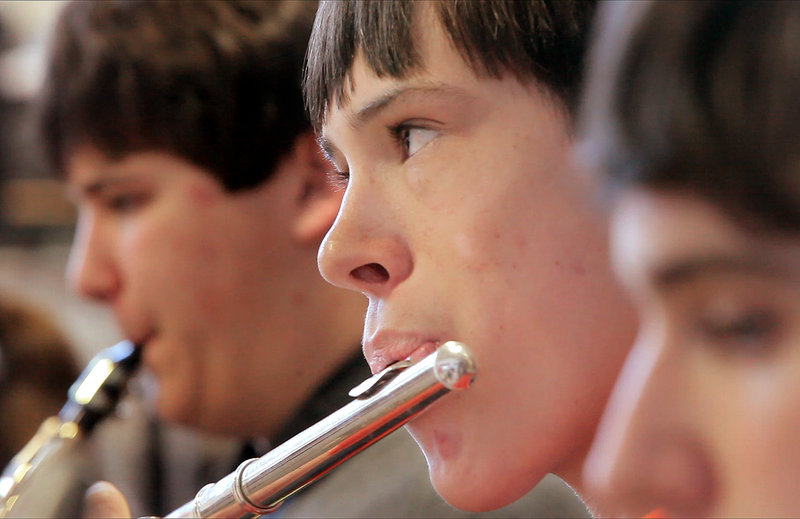 Sophomore Brian Weden plays the flute during rehearsal at South Portland High School on Thursday. The school's jazz band will compete in Boston on Saturday.