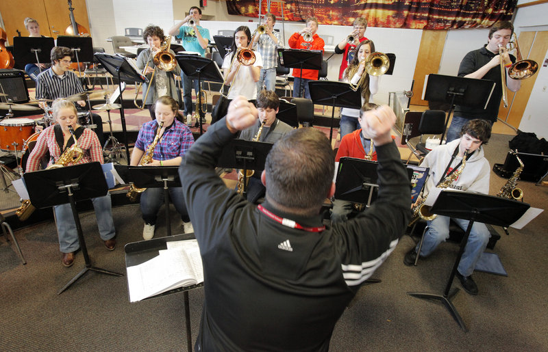 Craig Skeffington directs the South Portland High School Jazz Band on Thursday. The band was preparing for Saturday's competition at Berklee College of Music in Boston.