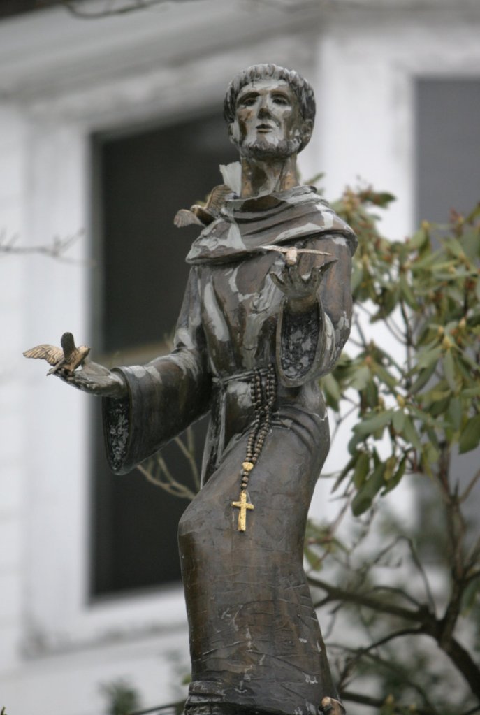 A statue of St. Francis of Assisi stands at St. Francis of Assisi Catholic Church in Minersville, Pa. Parishioners persuaded a Vatican panel to overturn a bishop's decision to shut the church.