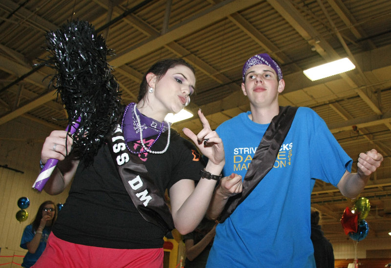 Miss and Mr. Dance Marathon – Deering High School students Caitlin Very and Scott Downs – demonstrate their stamina toward the end of the STRIVE Rocks Dance Marathon at the University of Southern Maine’s Sullivan Gym in Portland Sunday.