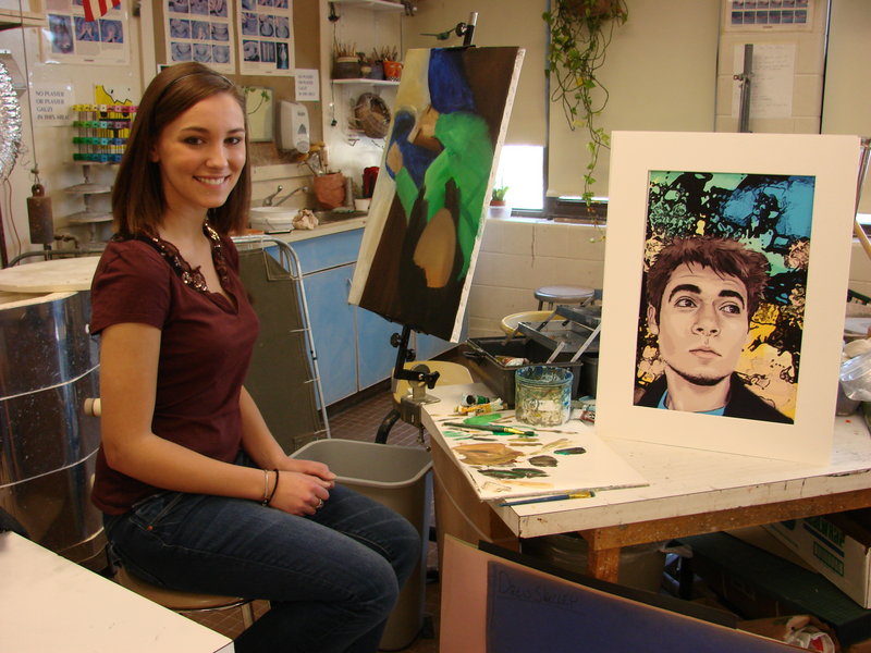 Emily Knight, a student at Wells High School, poses with an award-winning computer-generated drawing she created.