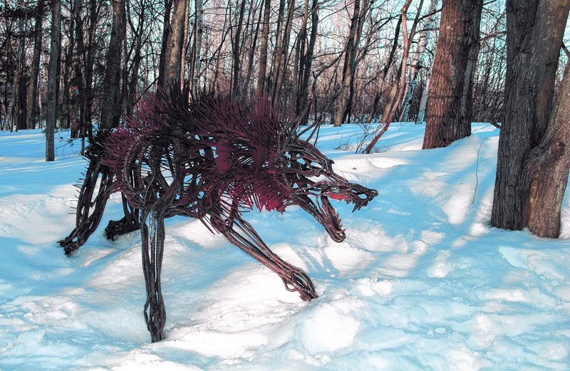 A wolf by sculptor Wendy Klemperer is part of the outdoor art display along the trails at Gilsland Farm through May.