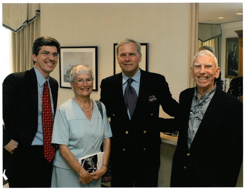 NBC newsman Tom Brokaw poses with John Putnam, right, Ginny Putnam and Tom Putnam at a 2005 forum.
