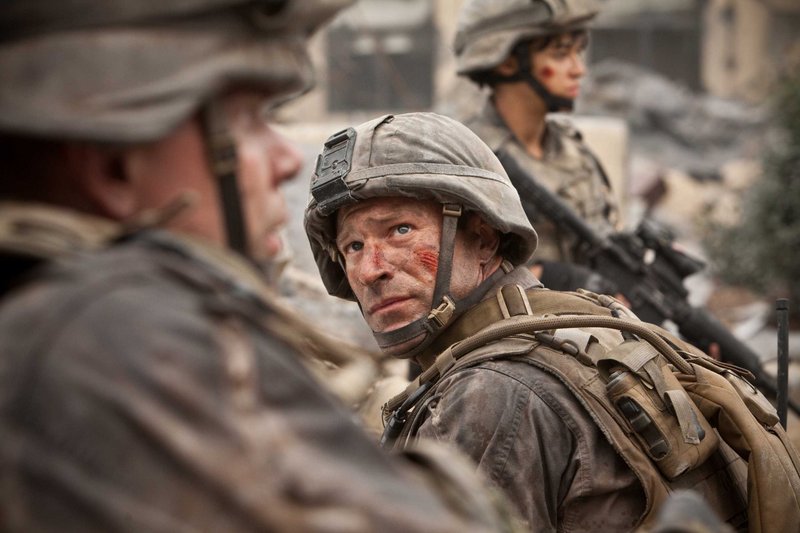 Aaron Eckhart soldiers on against extraterrestrial invaders in "Battle: Los Angeles."