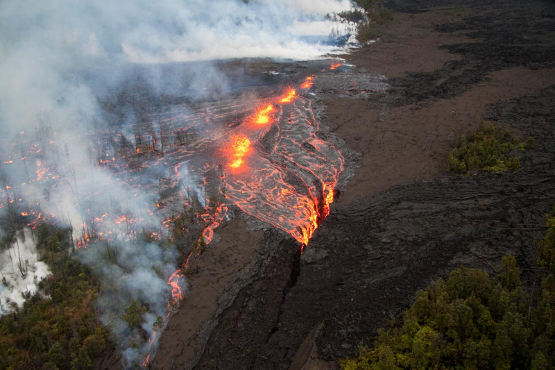 The Associated Press Lava spatters above a fissure on Sunday in Volcanoes National Park on the Big Island of Hawaii. No homes have been threatened by the latest eruption from Kilauea.