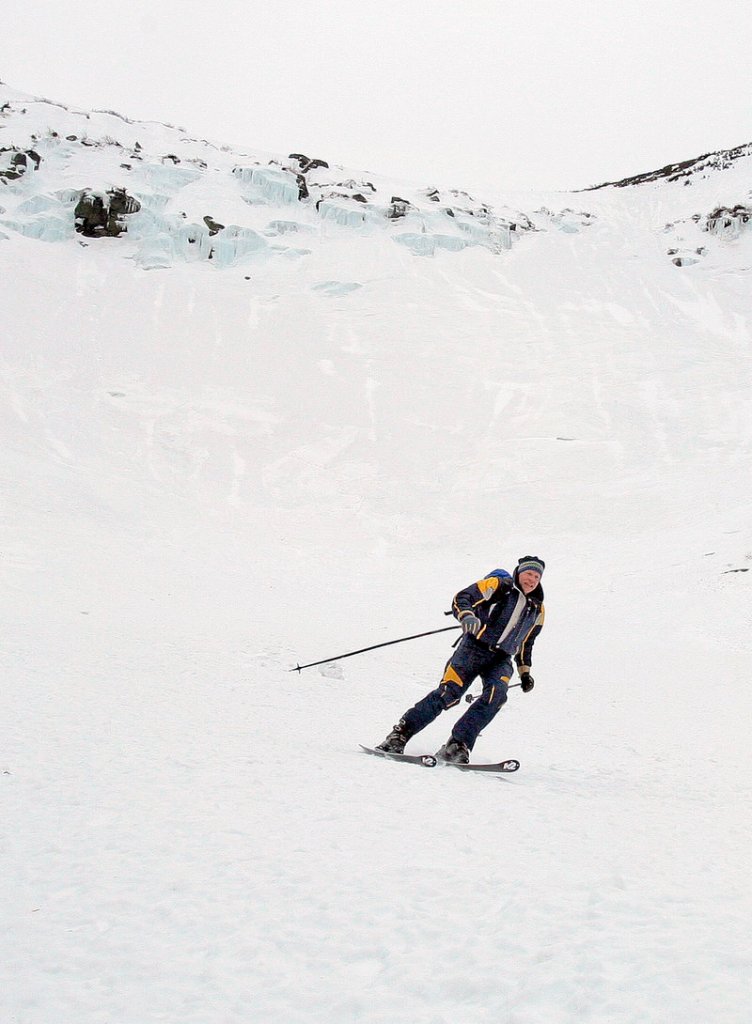 A skier descends Tuckerman Ravine in a previous spring. The Friends of Tuckerman Ravine will hold the Inferno race there April 15-17.
