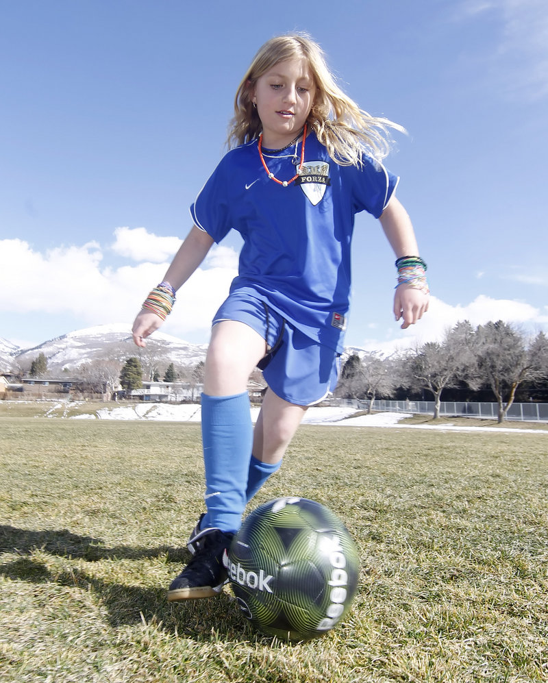Elizabeth Marston practices soccer at a school in Bountiful, Utah. Her father, Bradley Marston, bought a genetic test online a year ago that showed Elizabeth, then 9, has an advantageous gene for sports.