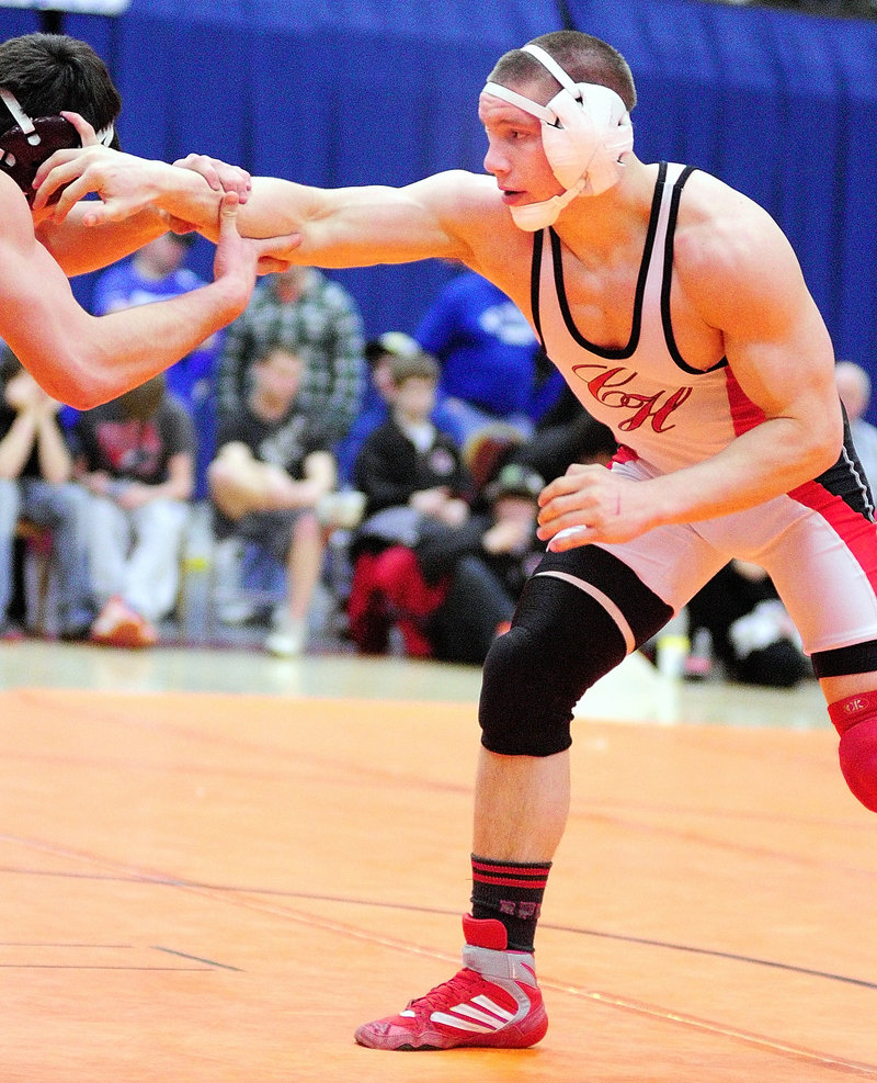 Jacob Powers chose wrestling over basketball when he entered Camden Hills High, with family tradition involved in his choice. "Wrestling has been in my family for quite a while," he said.