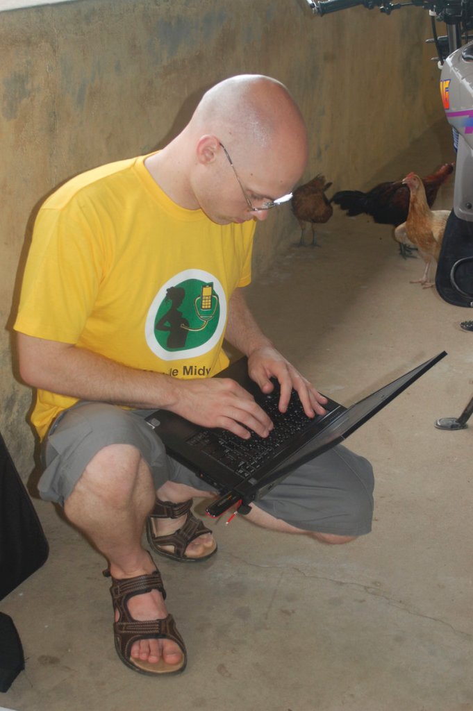 Brent Atkinson of Hollis was part of the University of Southern Maine team that helped create the Mobile Midwife program for nurses and pregnant women in Ghana. He is shown deploying the system last fall in Navrongo, Ghana.