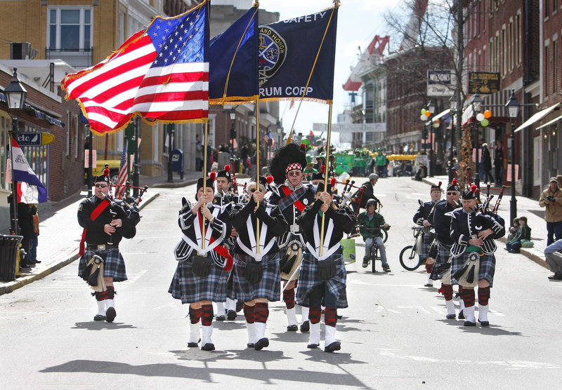 The Maine Public Safety Pipe and Drum Corps fills Front Street with music during the Bath Blarney Days parade Saturday.